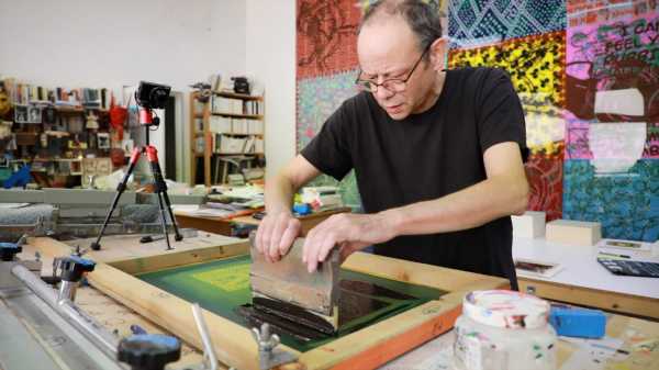 Portrait of the artist Jean-Pierre Sergent silkscreening his Shakti-Yoni: Ecstatic Cosmic Dances Series #54