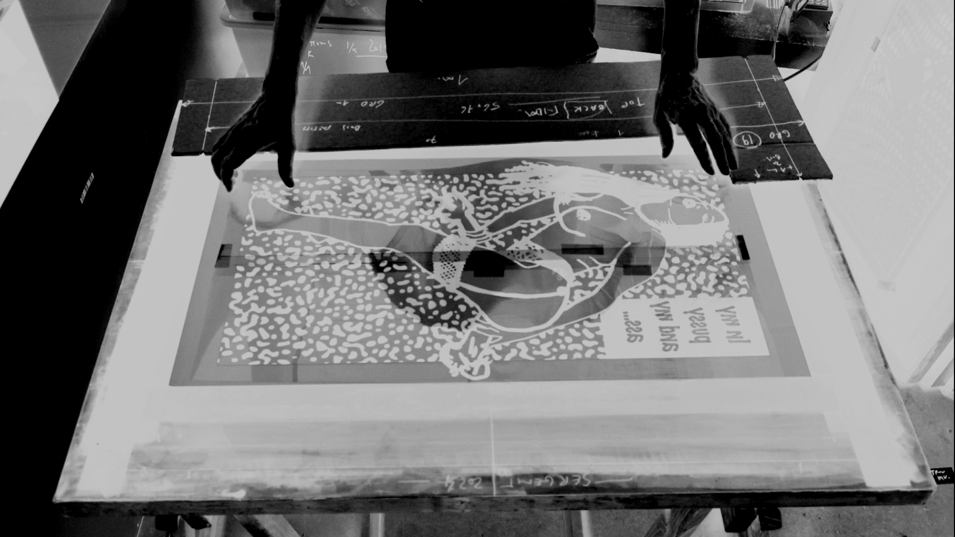 Artist working in his studio #20, exposing the silk-screen frames with the positifs films, photo by Lionel Georges, August 13th 2024